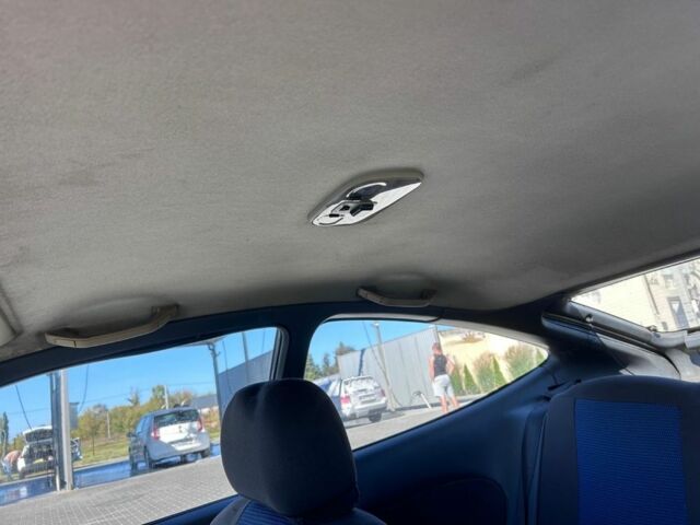 Зеленый Мазда 323, объемом двигателя 1.5 л и пробегом 317 тыс. км за 1300 $, фото 2 на Automoto.ua