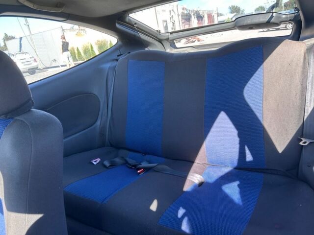 Зеленый Мазда 323, объемом двигателя 1.5 л и пробегом 317 тыс. км за 1300 $, фото 6 на Automoto.ua