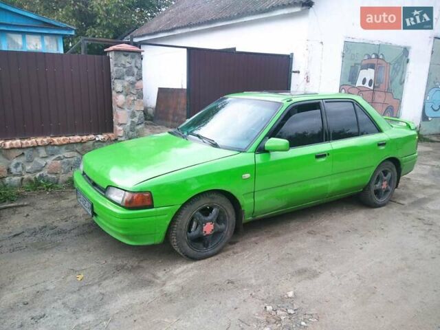 Зеленый Мазда 323, объемом двигателя 1.6 л и пробегом 444 тыс. км за 1700 $, фото 4 на Automoto.ua