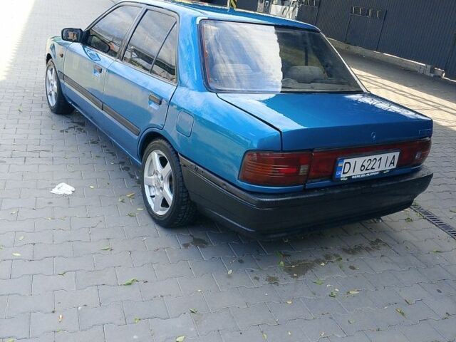 Зеленый Мазда 323, объемом двигателя 1.7 л и пробегом 300 тыс. км за 1250 $, фото 4 на Automoto.ua