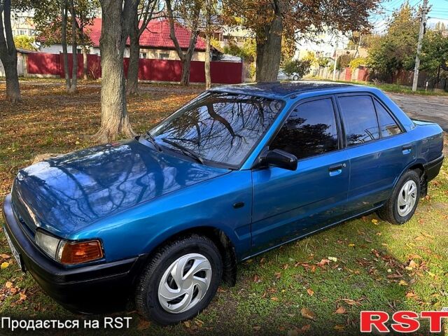 Зеленый Мазда 323, объемом двигателя 1.3 л и пробегом 200 тыс. км за 1250 $, фото 6 на Automoto.ua