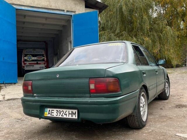 Зеленый Мазда 323, объемом двигателя 1.6 л и пробегом 522 тыс. км за 750 $, фото 5 на Automoto.ua