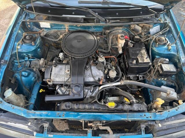Зелений Мазда 323, об'ємом двигуна 1.3 л та пробігом 200 тис. км за 1250 $, фото 12 на Automoto.ua