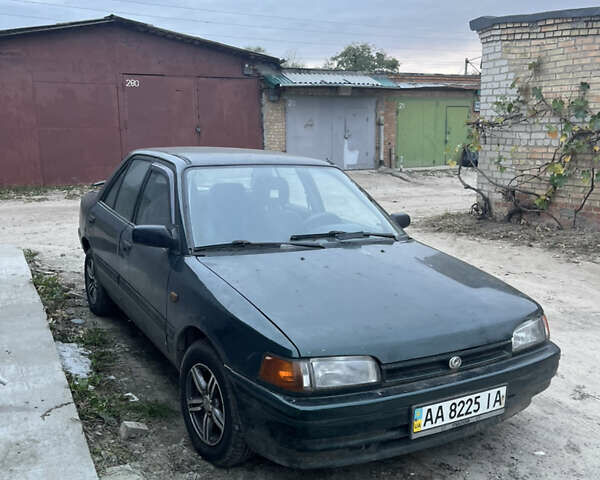 Зеленый Мазда 323, объемом двигателя 1.6 л и пробегом 368 тыс. км за 1200 $, фото 2 на Automoto.ua