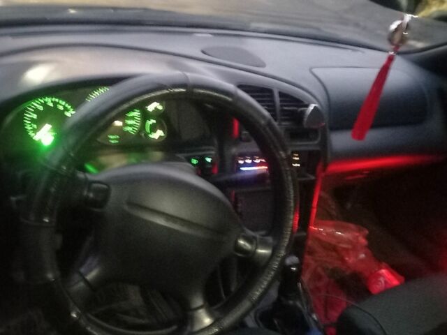 Зеленый Мазда 323, объемом двигателя 1.5 л и пробегом 185 тыс. км за 1700 $, фото 4 на Automoto.ua