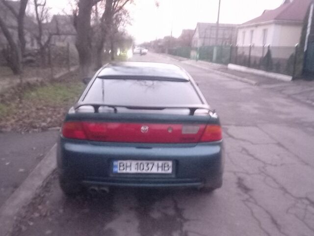 Зеленый Мазда 323, объемом двигателя 1.5 л и пробегом 185 тыс. км за 1700 $, фото 3 на Automoto.ua