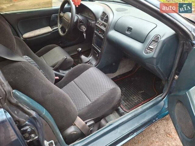 Зеленый Мазда 323, объемом двигателя 1.8 л и пробегом 460 тыс. км за 2900 $, фото 2 на Automoto.ua