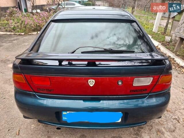 Зеленый Мазда 323, объемом двигателя 1.8 л и пробегом 460 тыс. км за 2900 $, фото 10 на Automoto.ua