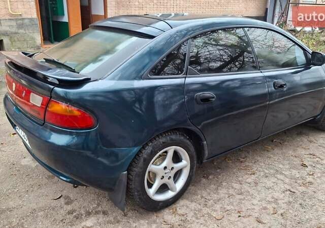 Зеленый Мазда 323, объемом двигателя 1.8 л и пробегом 460 тыс. км за 2900 $, фото 9 на Automoto.ua