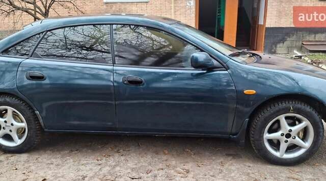 Зеленый Мазда 323, объемом двигателя 1.8 л и пробегом 460 тыс. км за 2900 $, фото 8 на Automoto.ua