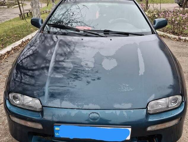 Зеленый Мазда 323, объемом двигателя 1.8 л и пробегом 460 тыс. км за 2900 $, фото 12 на Automoto.ua