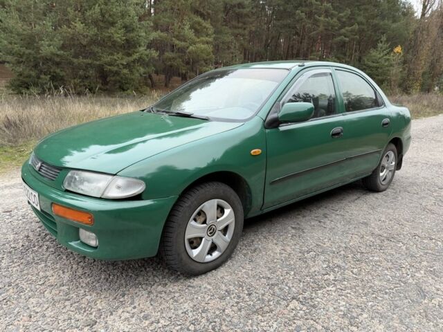 Зеленый Мазда 323, объемом двигателя 1.5 л и пробегом 213 тыс. км за 2950 $, фото 1 на Automoto.ua