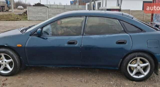 Зеленый Мазда 323, объемом двигателя 1.8 л и пробегом 460 тыс. км за 2900 $, фото 13 на Automoto.ua