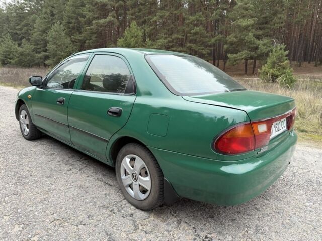 Зеленый Мазда 323, объемом двигателя 1.5 л и пробегом 213 тыс. км за 2950 $, фото 3 на Automoto.ua