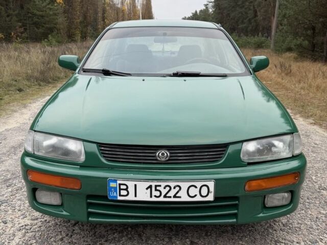 Зеленый Мазда 323, объемом двигателя 1.5 л и пробегом 213 тыс. км за 2950 $, фото 7 на Automoto.ua
