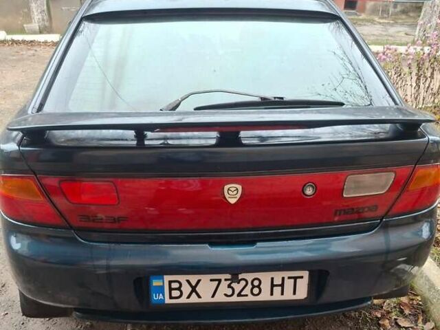 Зеленый Мазда 323, объемом двигателя 1.8 л и пробегом 460 тыс. км за 2900 $, фото 14 на Automoto.ua