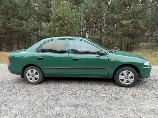 Зеленый Мазда 323, объемом двигателя 1.5 л и пробегом 213 тыс. км за 2950 $, фото 4 на Automoto.ua