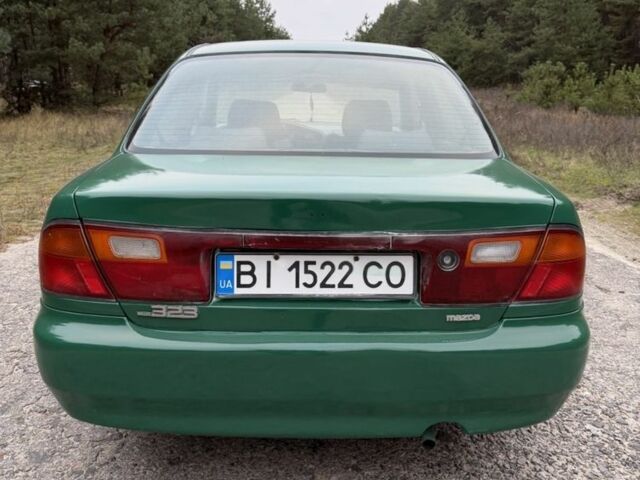 Зеленый Мазда 323, объемом двигателя 1.5 л и пробегом 213 тыс. км за 2950 $, фото 6 на Automoto.ua
