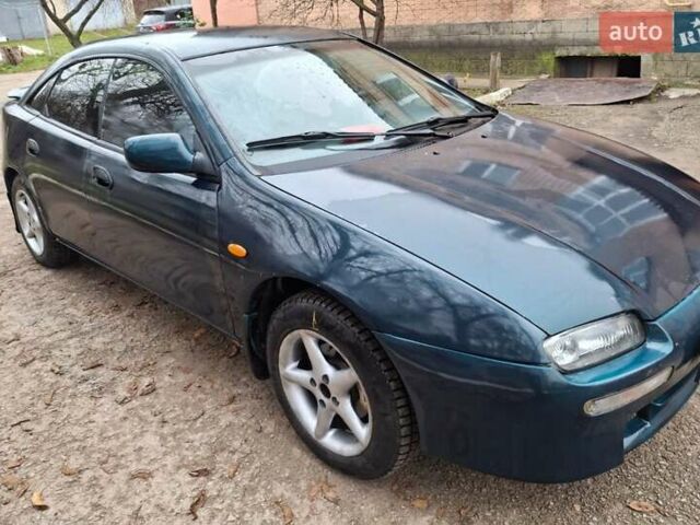 Зеленый Мазда 323, объемом двигателя 1.8 л и пробегом 460 тыс. км за 2900 $, фото 5 на Automoto.ua