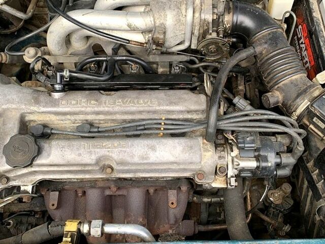 Зеленый Мазда 323, объемом двигателя 1.5 л и пробегом 254 тыс. км за 1800 $, фото 2 на Automoto.ua