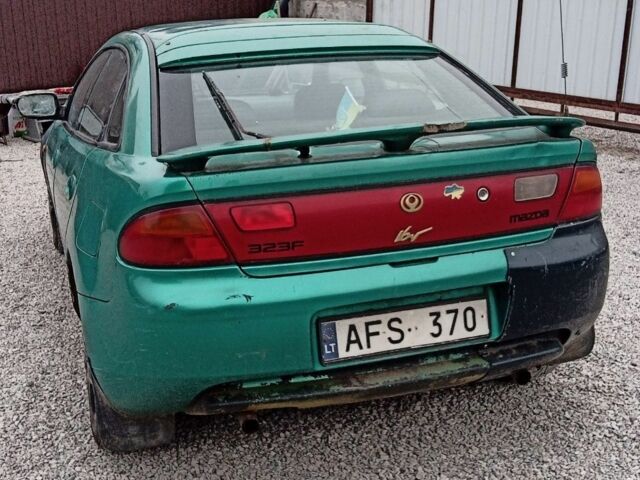 Зелений Мазда 323, об'ємом двигуна 1.5 л та пробігом 100 тис. км за 525 $, фото 3 на Automoto.ua