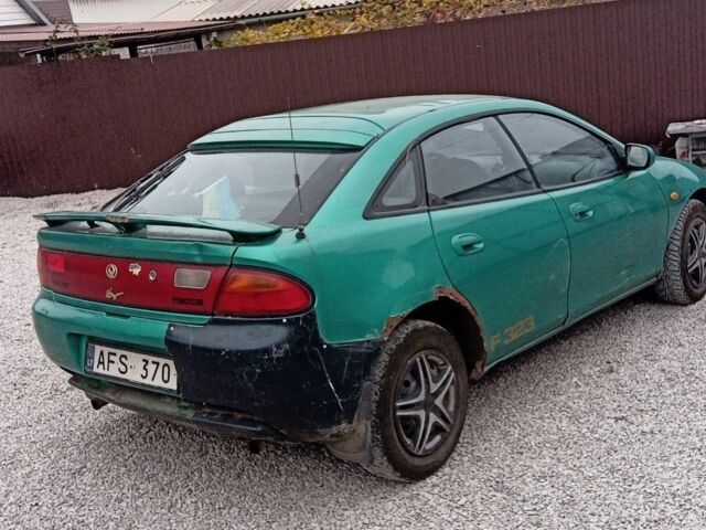 Зелений Мазда 323, об'ємом двигуна 1.5 л та пробігом 100 тис. км за 525 $, фото 2 на Automoto.ua