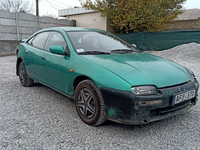 Зелений Мазда 323, об'ємом двигуна 1.5 л та пробігом 100 тис. км за 525 $, фото 1 на Automoto.ua