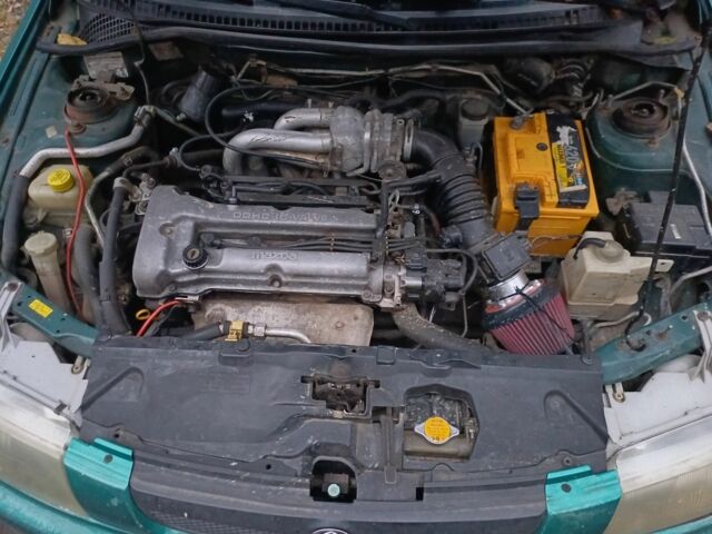 Зеленый Мазда 323, объемом двигателя 1.5 л и пробегом 308 тыс. км за 1548 $, фото 4 на Automoto.ua