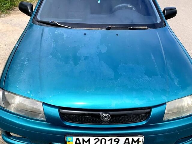 Зеленый Мазда 323, объемом двигателя 1.5 л и пробегом 254 тыс. км за 1800 $, фото 11 на Automoto.ua