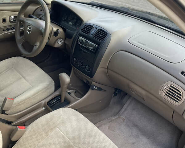 Мазда 323 2000 в Львове на Automoto.ua Зеленый Мазда 323, объемом двигателя 1.6 л и пробегом 240 тыс. км за 3200 $, фото 11 на Automoto.ua