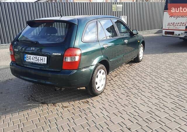 Зелений Мазда 323, об'ємом двигуна 1.3 л та пробігом 167 тис. км за 3473 $, фото 3 на Automoto.ua