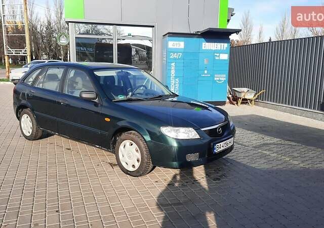 Зелений Мазда 323, об'ємом двигуна 1.3 л та пробігом 167 тис. км за 3473 $, фото 9 на Automoto.ua