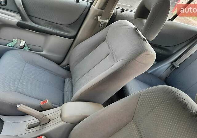 Зелений Мазда 323, об'ємом двигуна 1.3 л та пробігом 167 тис. км за 3473 $, фото 7 на Automoto.ua