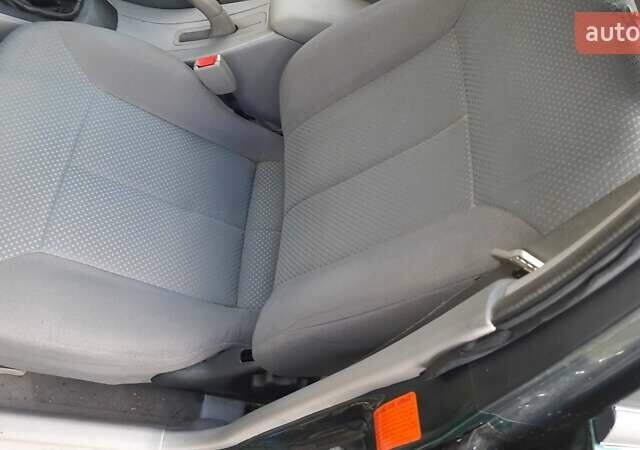 Зелений Мазда 323, об'ємом двигуна 1.3 л та пробігом 167 тис. км за 3473 $, фото 6 на Automoto.ua