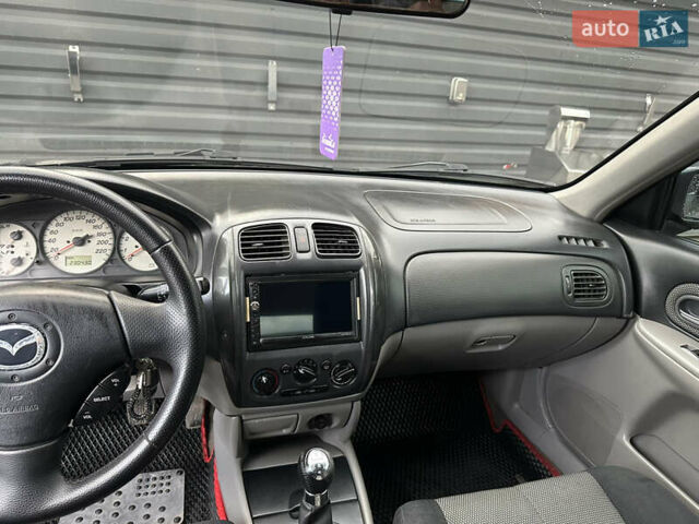 Зеленый Мазда 323, объемом двигателя 1.6 л и пробегом 230 тыс. км за 3000 $, фото 10 на Automoto.ua