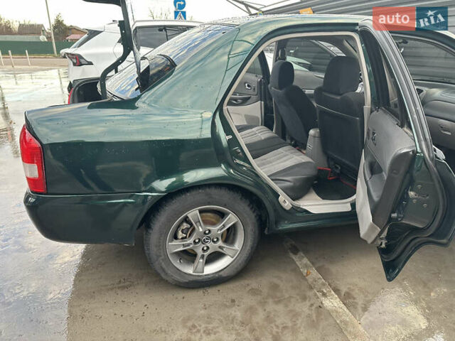 Зеленый Мазда 323, объемом двигателя 1.6 л и пробегом 230 тыс. км за 3000 $, фото 14 на Automoto.ua