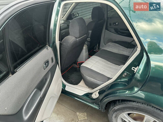 Зеленый Мазда 323, объемом двигателя 1.6 л и пробегом 230 тыс. км за 3000 $, фото 12 на Automoto.ua