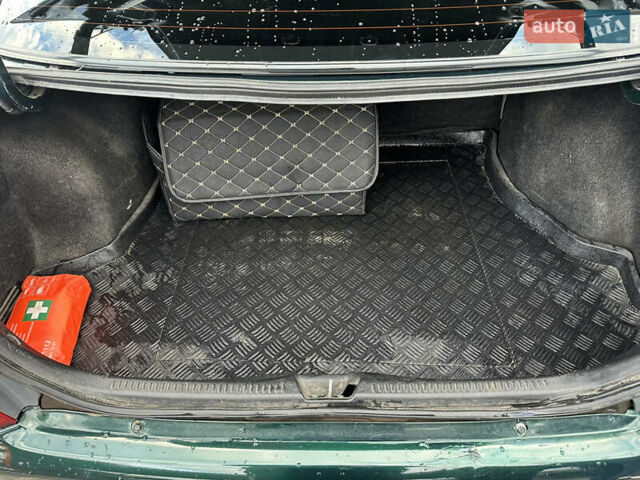 Зеленый Мазда 323, объемом двигателя 1.6 л и пробегом 230 тыс. км за 3000 $, фото 7 на Automoto.ua