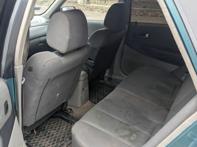 Зеленый Мазда 323, объемом двигателя 1.6 л и пробегом 289 тыс. км за 1999 $, фото 7 на Automoto.ua