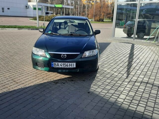 Зелений Мазда 323, об'ємом двигуна 1.3 л та пробігом 167 тис. км за 3473 $, фото 1 на Automoto.ua