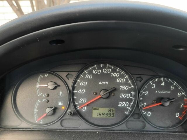 Зелений Мазда 323, об'ємом двигуна 1.3 л та пробігом 167 тис. км за 3473 $, фото 6 на Automoto.ua