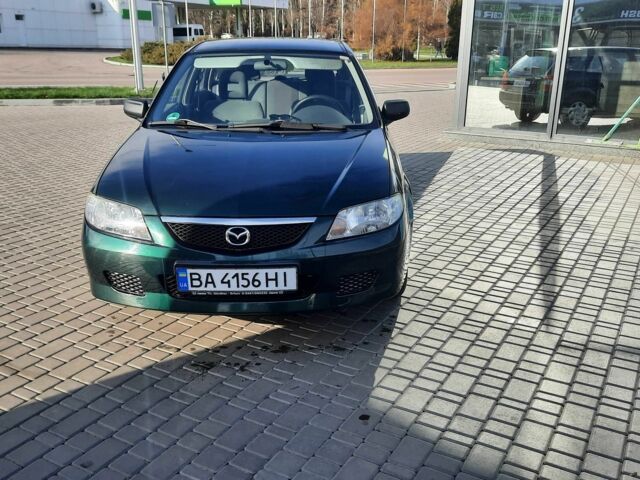 Зелений Мазда 323, об'ємом двигуна 1.3 л та пробігом 167 тис. км за 3473 $, фото 2 на Automoto.ua