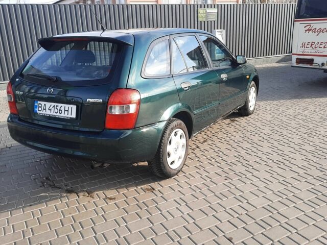 Зелений Мазда 323, об'ємом двигуна 1.3 л та пробігом 167 тис. км за 3473 $, фото 4 на Automoto.ua