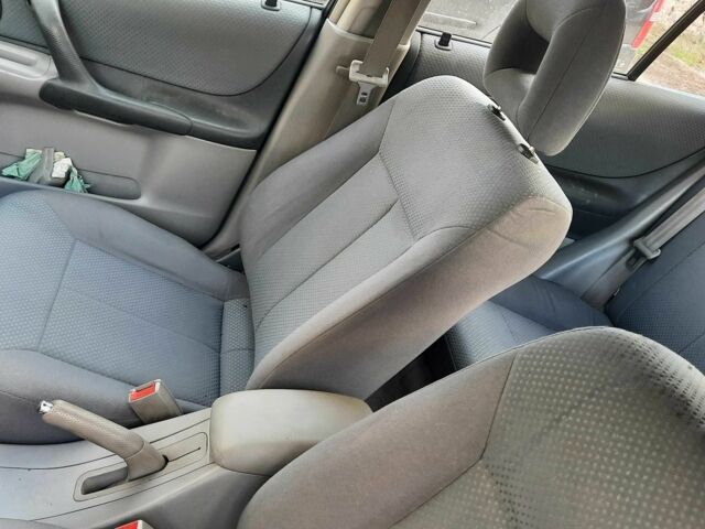 Зелений Мазда 323, об'ємом двигуна 1.3 л та пробігом 167 тис. км за 3473 $, фото 8 на Automoto.ua