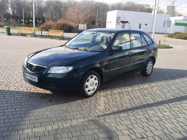 Зелений Мазда 323, об'ємом двигуна 1.3 л та пробігом 167 тис. км за 3473 $, фото 9 на Automoto.ua