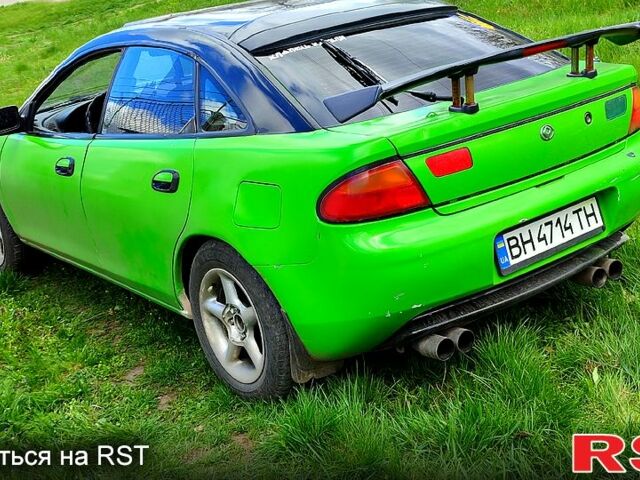 Зеленый Мазда 323, объемом двигателя 1.5 л и пробегом 218 тыс. км за 2000 $, фото 2 на Automoto.ua