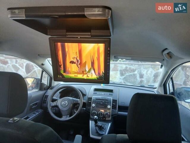 Білий Мазда 5, об'ємом двигуна 2 л та пробігом 279 тис. км за 5800 $, фото 1 на Automoto.ua