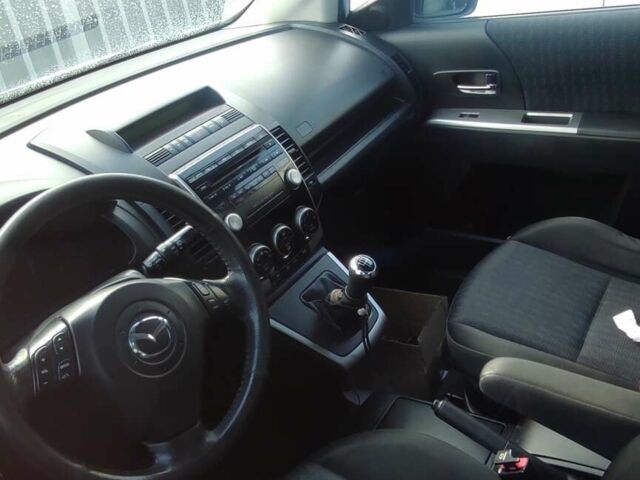 Білий Мазда 5, об'ємом двигуна 2 л та пробігом 203 тис. км за 5250 $, фото 1 на Automoto.ua