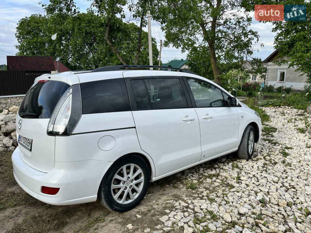 Білий Мазда 5, об'ємом двигуна 2 л та пробігом 175 тис. км за 7000 $, фото 1 на Automoto.ua