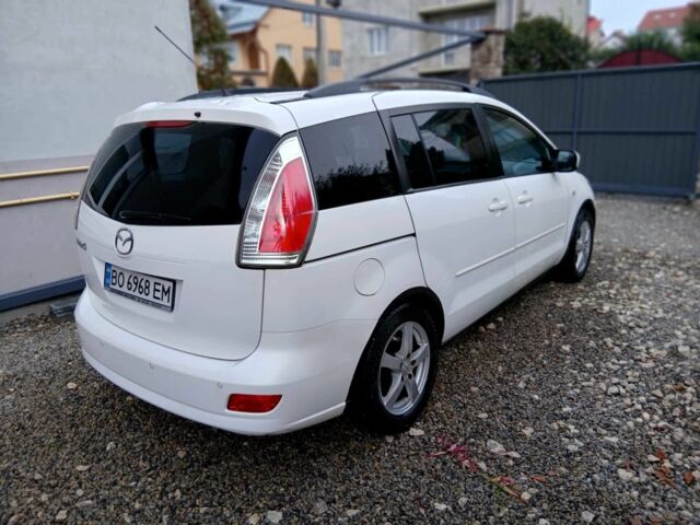Белый Мазда 5, объемом двигателя 2 л и пробегом 277 тыс. км за 5900 $, фото 1 на Automoto.ua